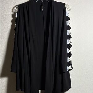 Black Cardigan with White Ruffle Accents